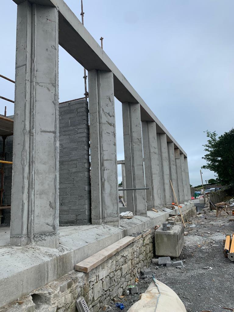 concrete pillars on a hotel construction site